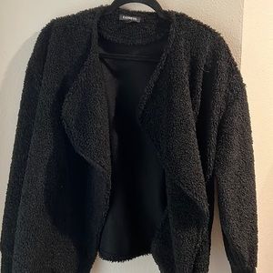 A fancy black cardigan! Extremely soft and cozy. Size small